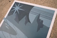 a poster with a moon and stars on it